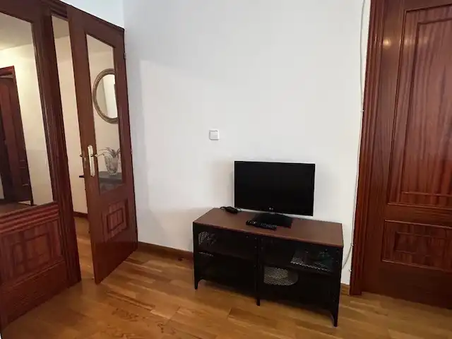 Sala de estar de Apartamento en venta en Sanxenxo con Terraza, Trastero y Amueblado