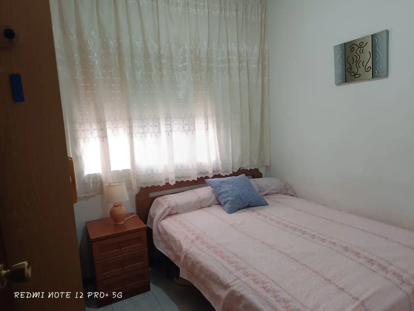 Schlafzimmer von Wohnung zum Verkauf in Cunit mit Privatgarten, Terrasse und Ofen