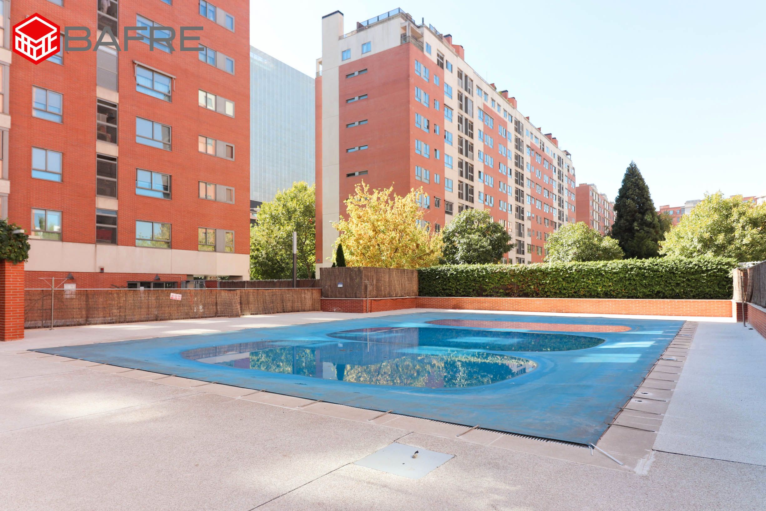 Swimming pool of Flat for sale in  Madrid Capital  with Air Conditioner, Heating and Storage room