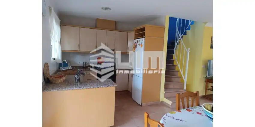 Cuina de Casa adosada en venda en Sagunto / Sagunt amb Terrassa