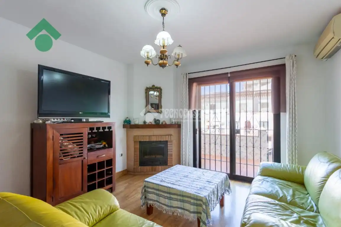 Sala de estar de Casa adosada en venta en Nerja con Aire acondicionado y Balcón
