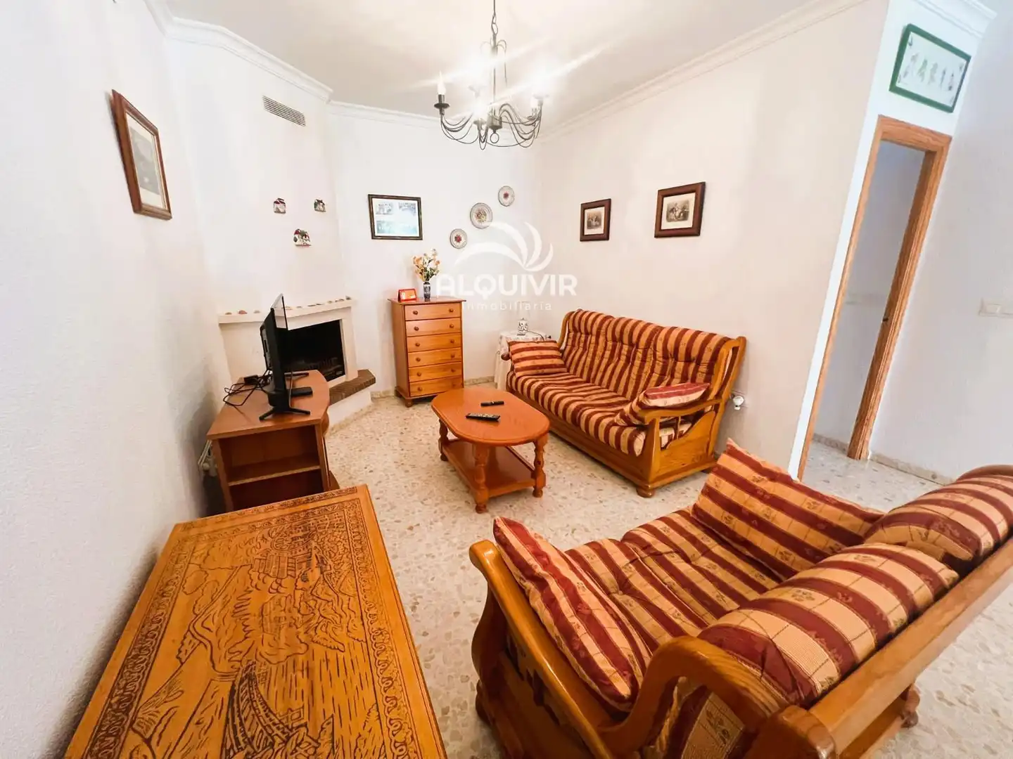 Sala d'estar de Casa adosada en venda en Almonte amb Jardí privat, Terrassa i Piscina