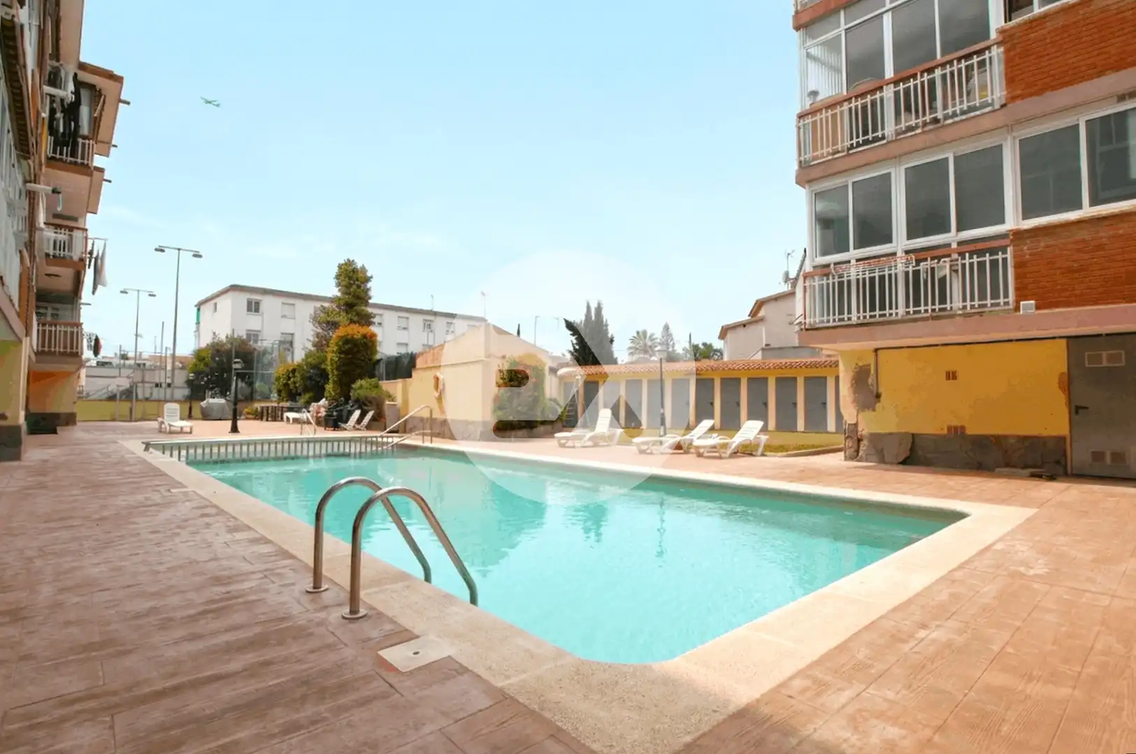 Swimming pool of Flat for sale in Castelldefels  with Air Conditioner, Heating and Storage room