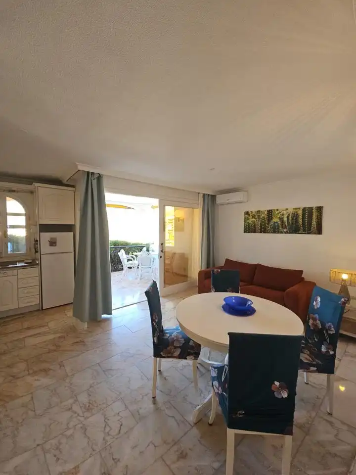 Living room of Ground floor for rent in Mogán  with Air Conditioner, Terrace and Furnished