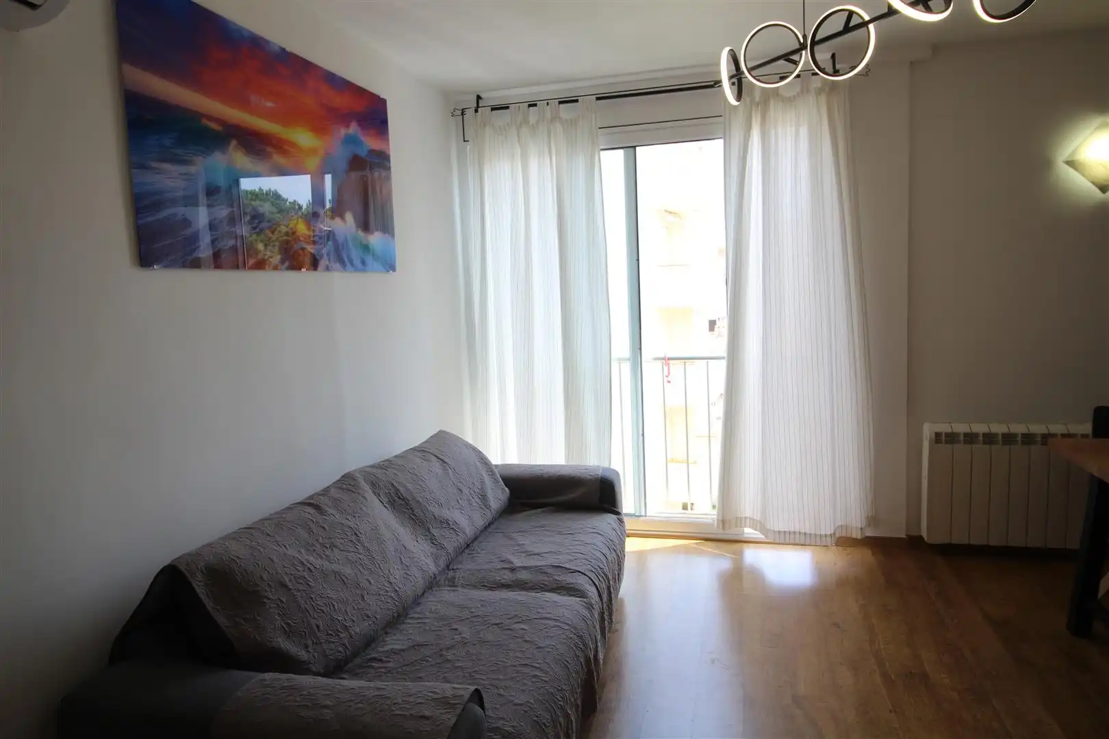 Sala d'estar de Apartament en venda en L'Escala amb Calefacció, Jardí privat i Parquet