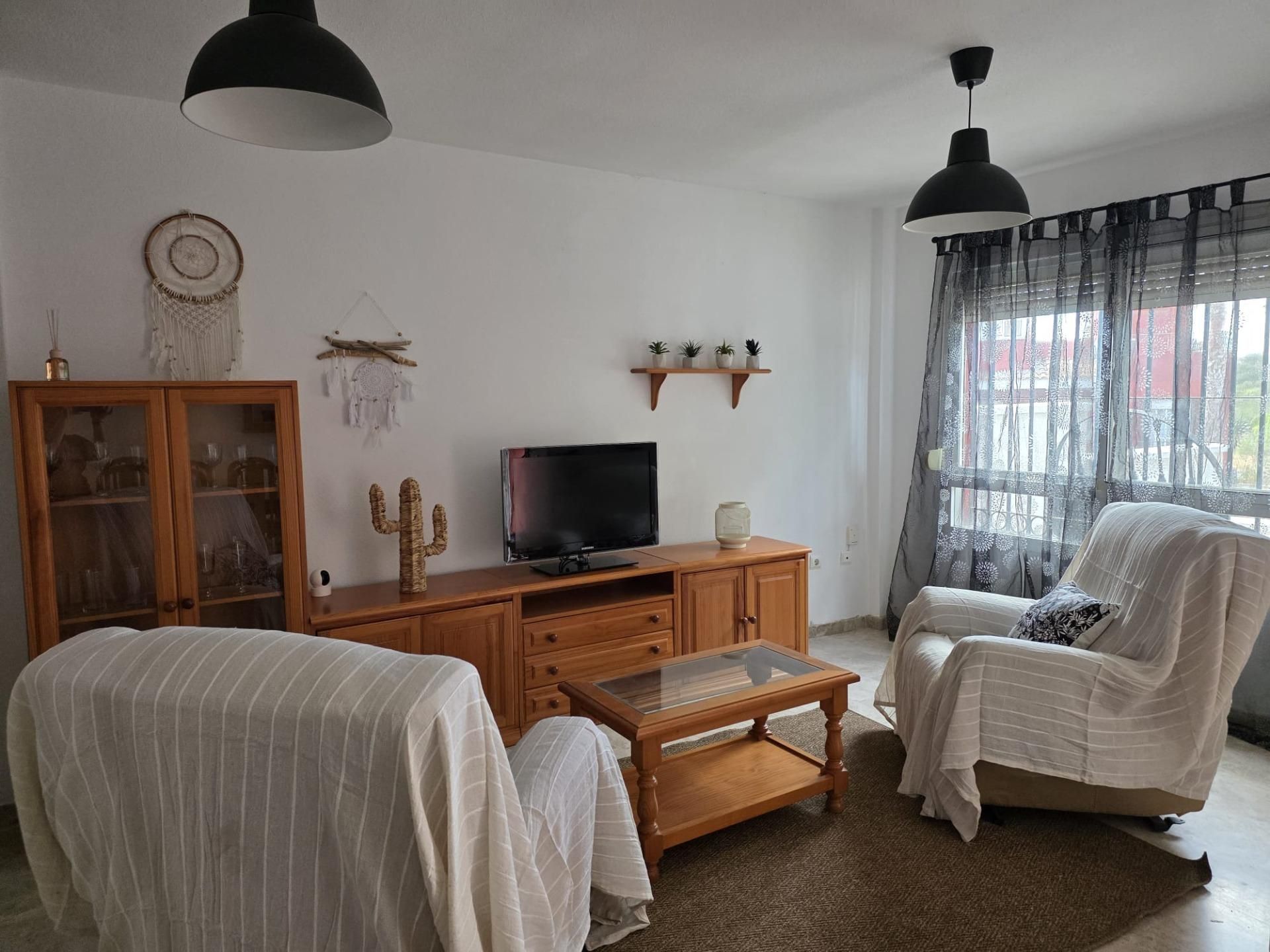 Living room of Single-family semi-detached for sale in Vélez-Málaga  with Air Conditioner, Private garden and Terrace