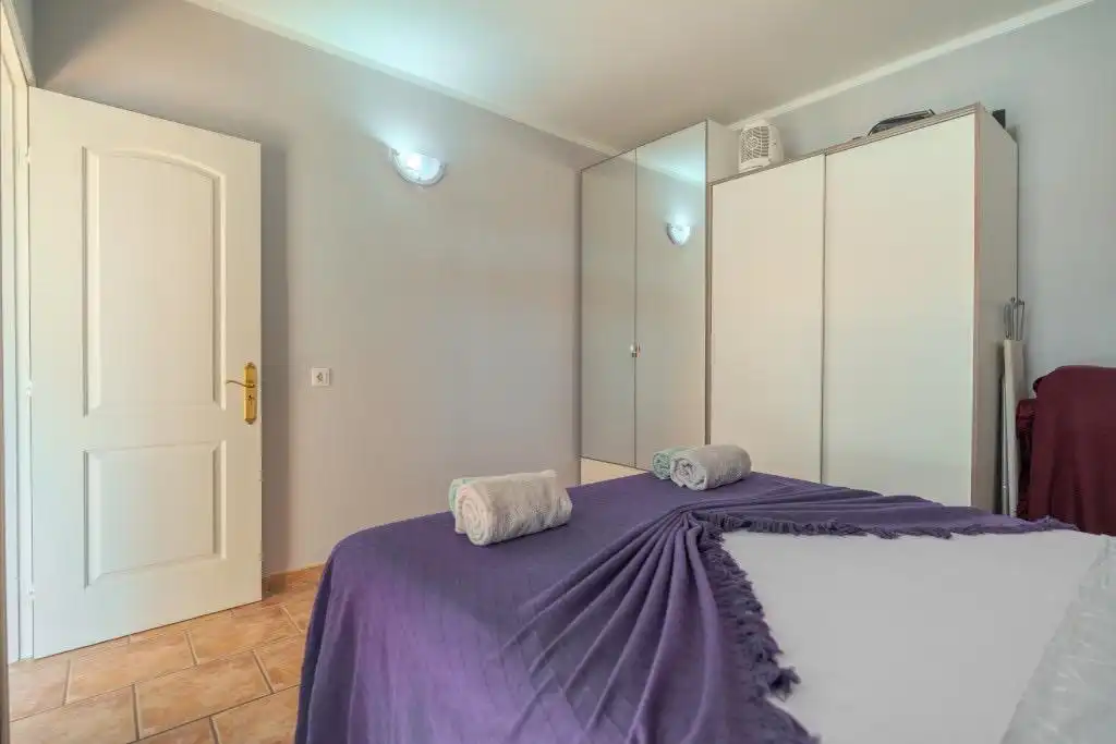 Schlafzimmer von Wohnungen zum Verkauf in Arona mit Privatgarten, Terrasse und Möbliert