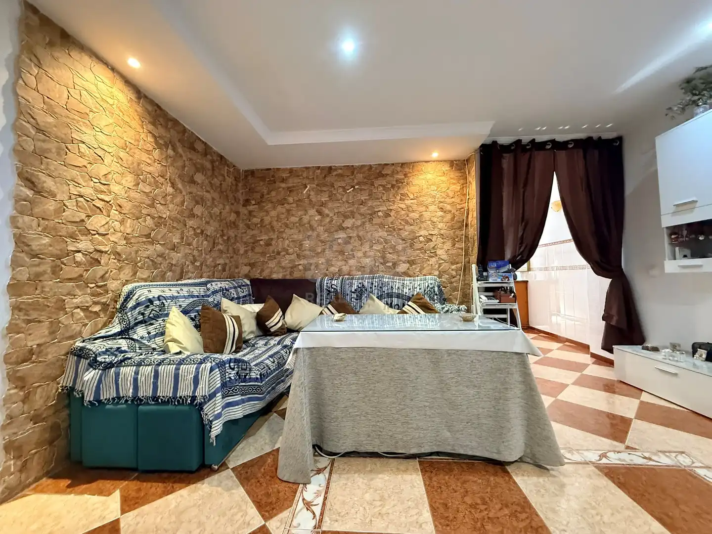 Sala de estar de Casa adosada en venta en Huelva con Aire acondicionado y Calefacción