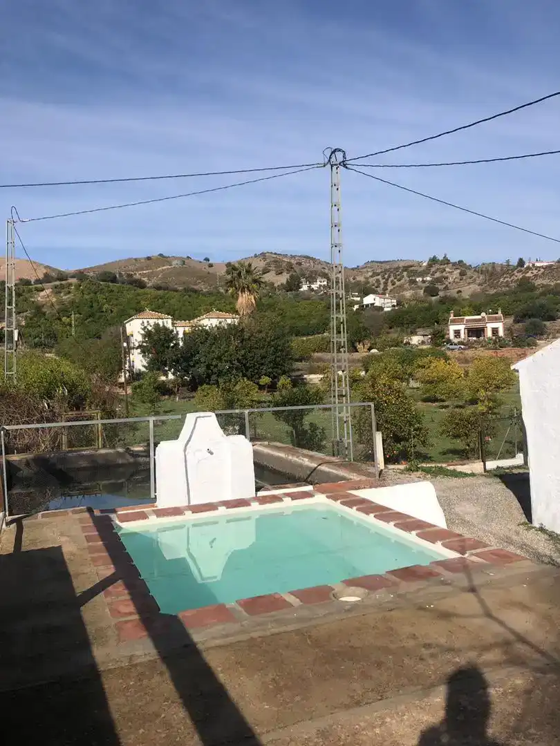 Außenansicht von Wohnung zur Miete in Álora mit Privatgarten, Abstellraum und Schwimmbad