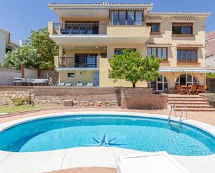 Garden of House or chalet for sale in Benalmádena  with Air Conditioner, Heating and Private garden