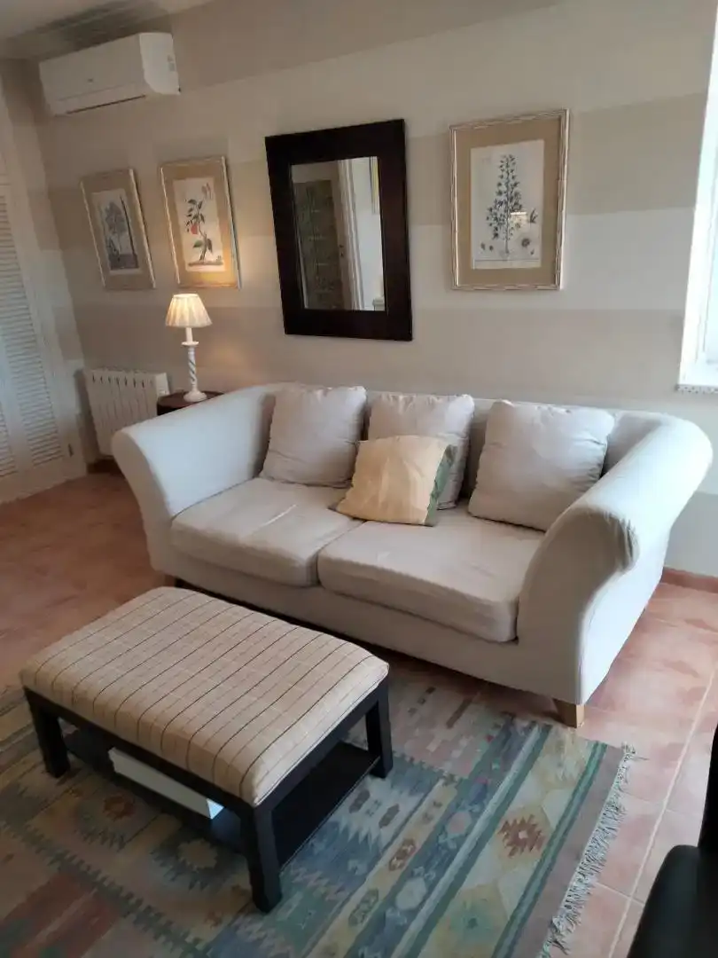 Living room of Flat for rent in Pollença  with Air Conditioner, Private garden and Furnished