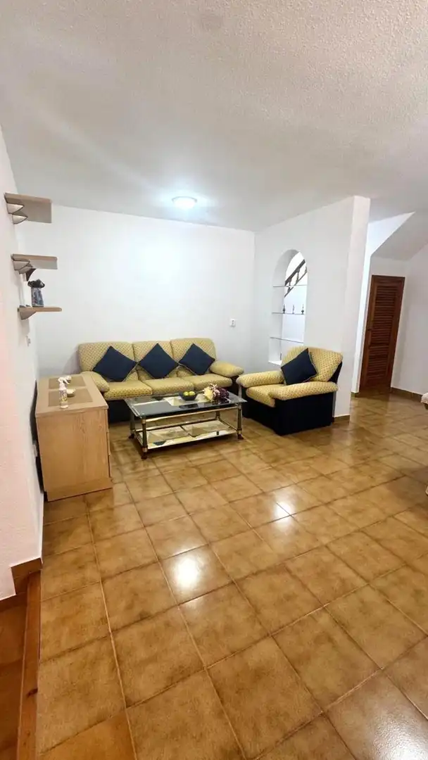 Sala d'estar de Casa adosada en venda en Orihuela amb Jardí privat, Terrassa i Traster
