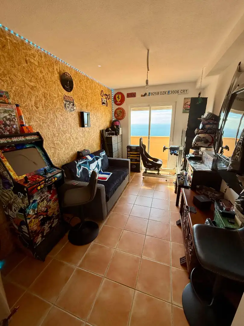Sala d'estar de Casa adosada en venda en Torrox amb Aire condicionat, Calefacció i Jardí privat