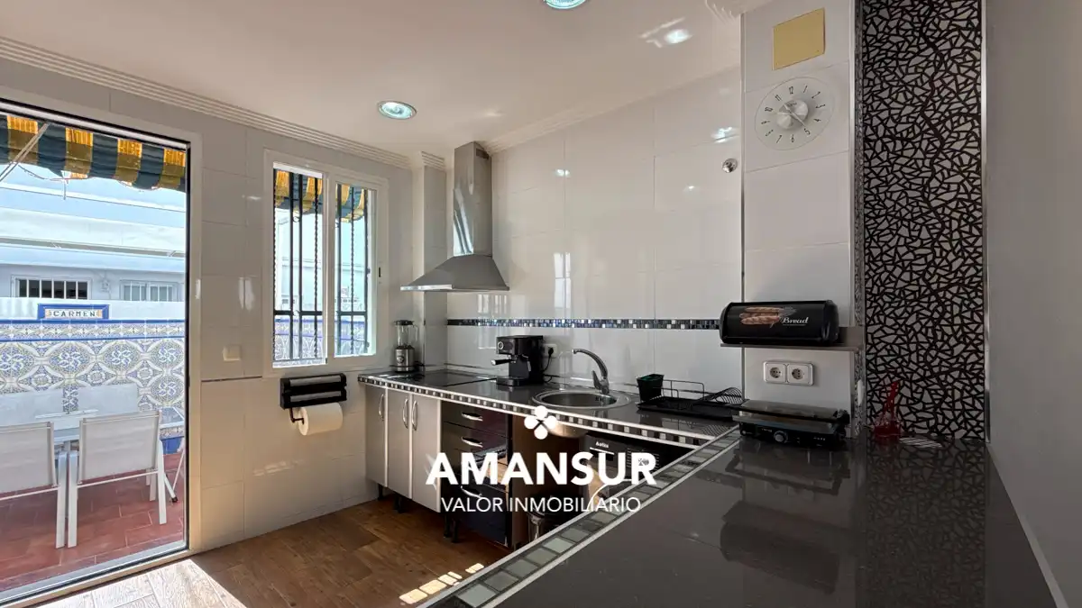 Cocina de Casa adosada en venta en Cartaya con Terraza y Alarma
