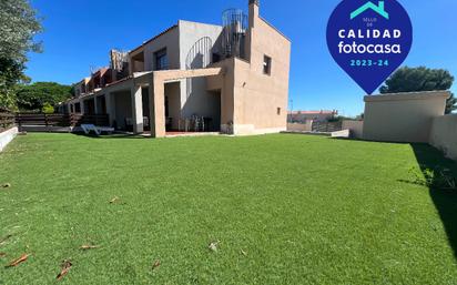 Jardí de Casa adosada en venda en Mont-roig del Camp amb Aire condicionat, Terrassa i Balcó