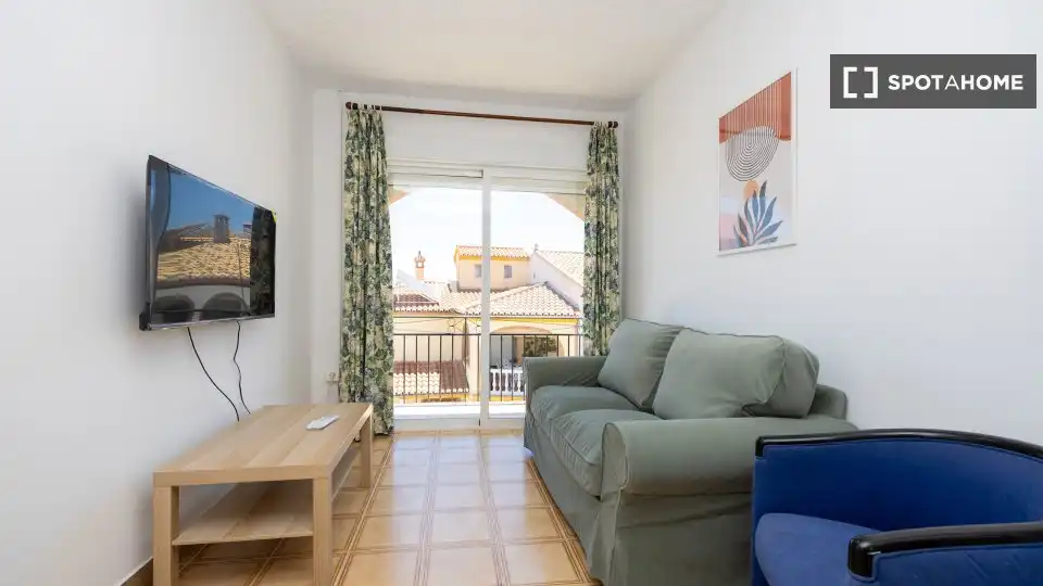 Sala de estar de Apartamento para compartir en Escúzar con Aire acondicionado, Terraza y Amueblado