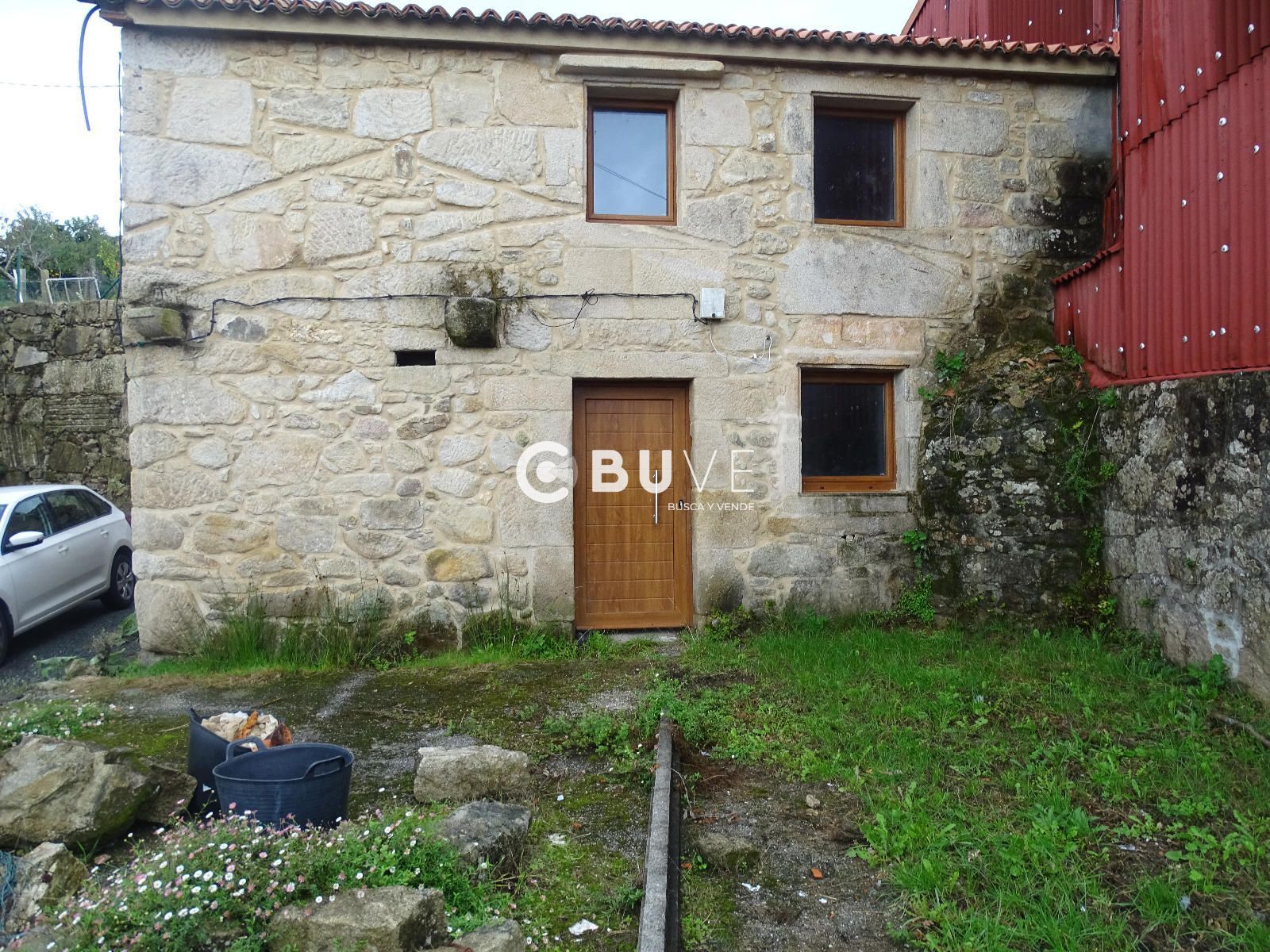 Vista exterior de Casa adosada en venda en Brión amb Jardí privat, Terrassa i Traster