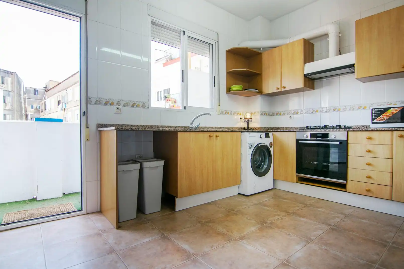 Kitchen of Flat for share in Valencia  with Heating, Washing machine and TV