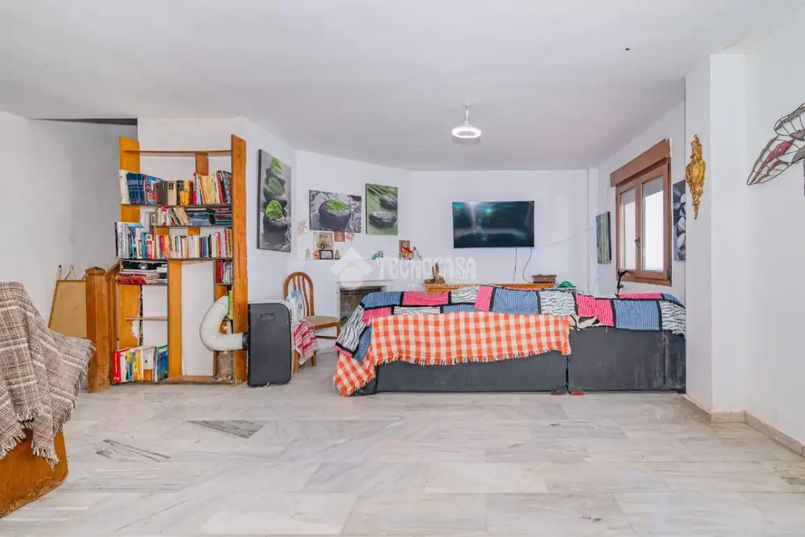 Sala d'estar de Casa adosada en venda en La Zubia amb Terrassa i Piscina comunitària