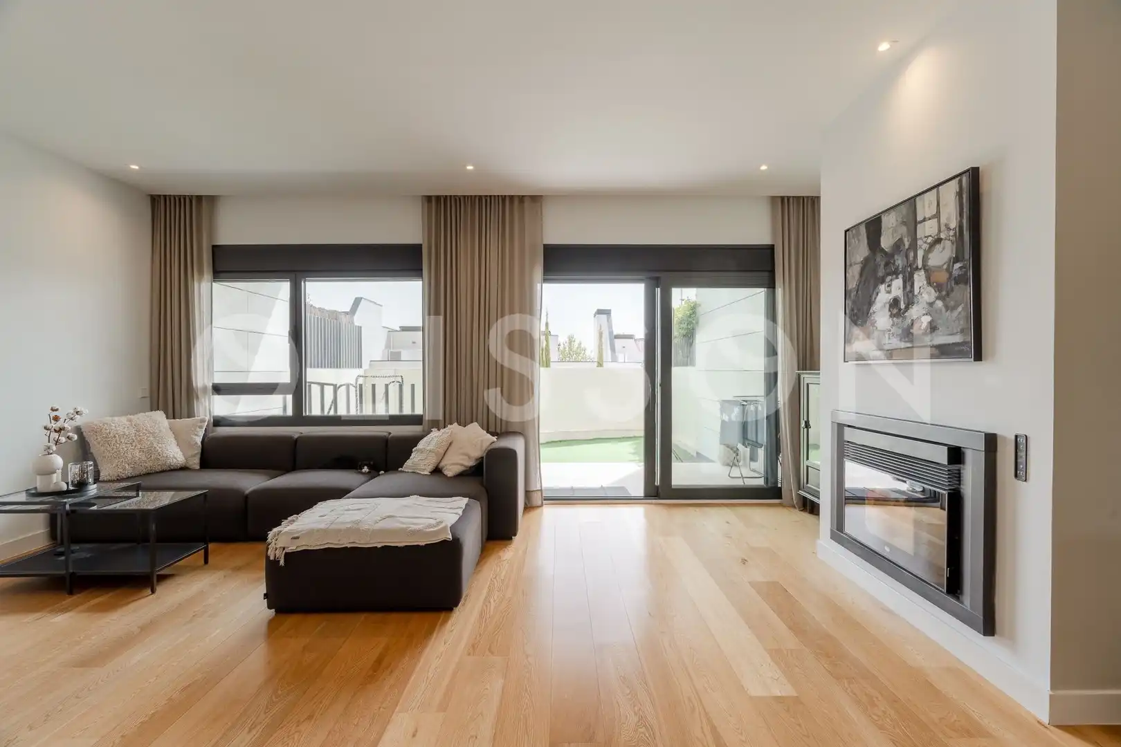 Sala de estar de Casa adosada en venta en La Moraleja con Aire acondicionado, Calefacción y Terraza