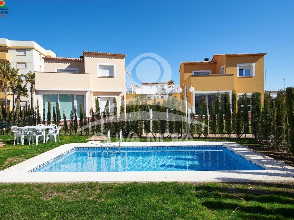 Exterior view of Single-family semi-detached for sale in Oliva  with Private garden, Terrace and Swimming Pool