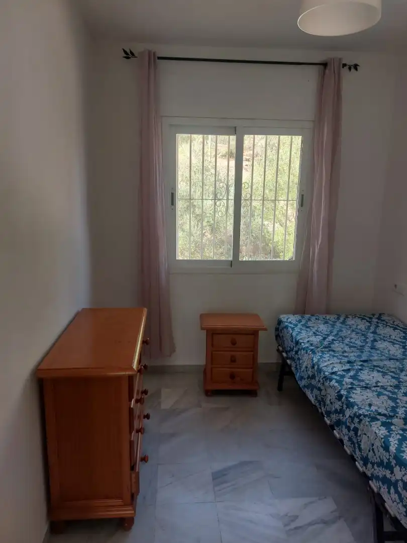 Habitación de Casa adosada de alquiler en Benalmádena con Aire acondicionado, Terraza y Amueblado