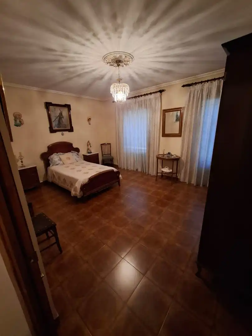 Dormitori de Casa adosada en venda en Jabalquinto amb Traster, Piscina i Domòtica