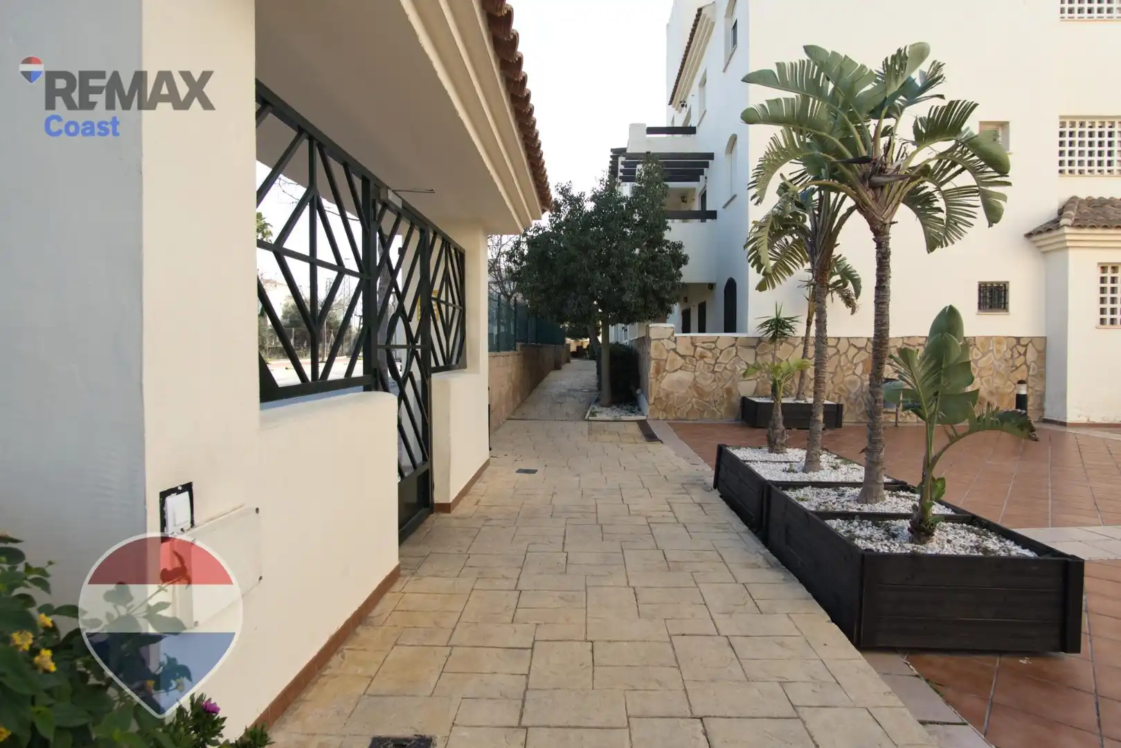 Außenansicht von Wohnung zum Verkauf in Benalmádena mit Klimaanlage, Privatgarten und Gemeinschaftspool