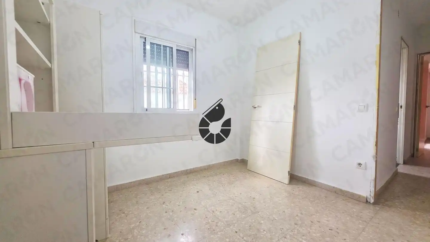 Habitación de Casa adosada en venta en Coria del Río con Aire acondicionado