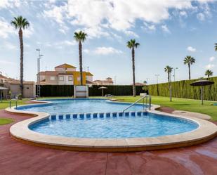 Piscina de Casa o xalet en venda en Torrevieja amb Aire condicionat, Terrassa i Piscina comunitària