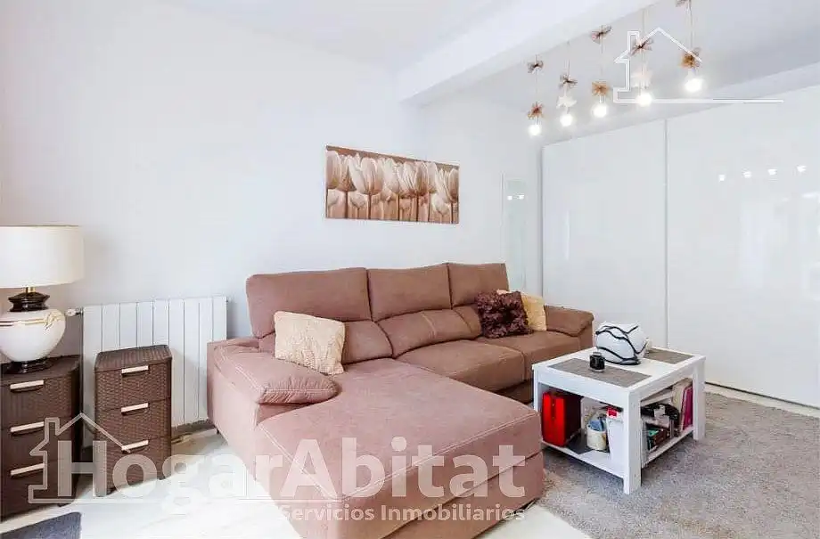 Sala d'estar de Casa adosada en venda en Pedreguer amb Aire condicionat, Jardí privat i Terrassa
