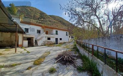 Außenansicht von Country house zum verkauf in  Granada Capital mit Privatgarten und Terrasse
