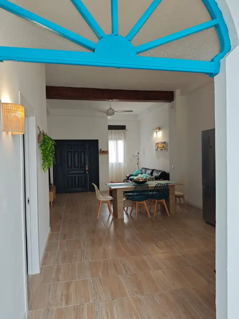 Sala d'estar de Casa adosada en venda en Cullera amb Aire condicionat, Piscina i Moblat