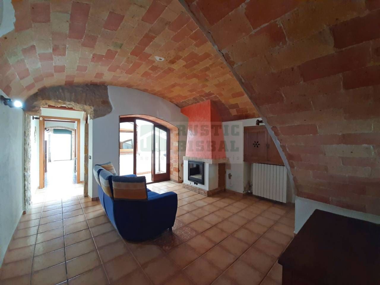 Sala d'estar de Finca rústica en venda en La Bisbal d'Empordà amb Aire condicionat, Calefacció i Jardí privat