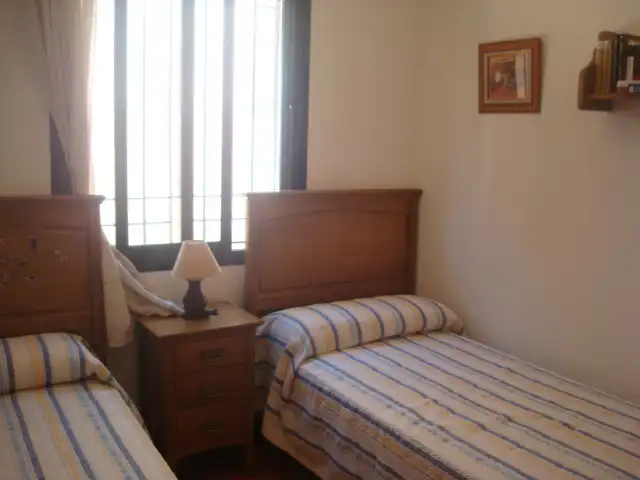 Schlafzimmer von Erdgeschoss zur Miete in Chiclana de la Frontera mit Klimaanlage, Heizung und Terrasse