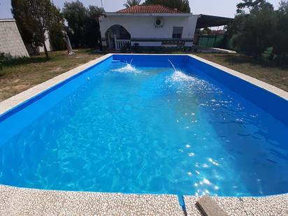 Swimming pool of House or chalet for sale in Utrera  with Air Conditioner and Swimming Pool