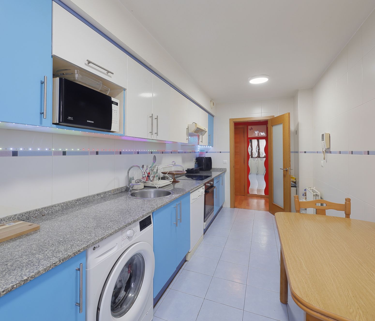 Kitchen of Flat for sale in Gijón   with Heating, Parquet flooring and Storage room