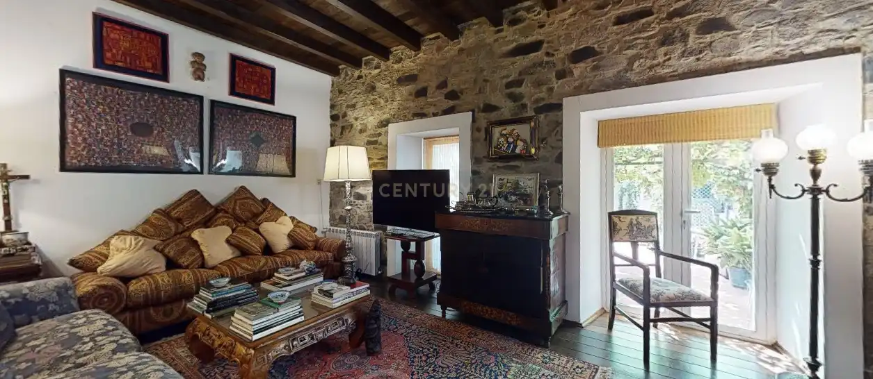 Living room of Houses for sale in Piedrabuena  with Air Conditioner, Private garden and Storage room