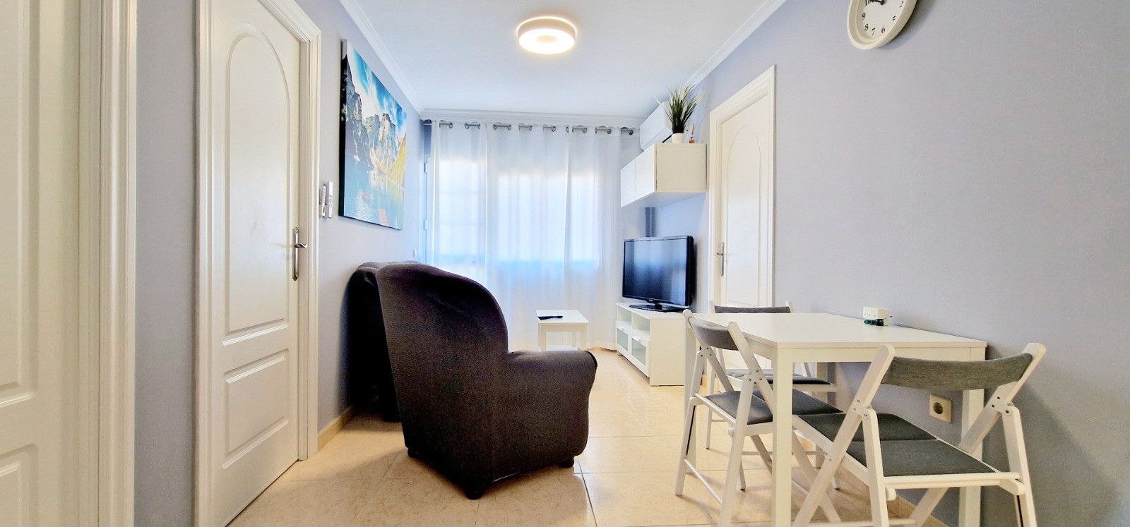 Sala d'estar de Apartament en venda en Fuengirola amb Aire condicionat, Terrassa i Moblat