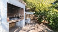 Vista exterior de Casa o xalet en venda en Callosa d'En Sarrià amb Aire condicionat, Terrassa i Piscina