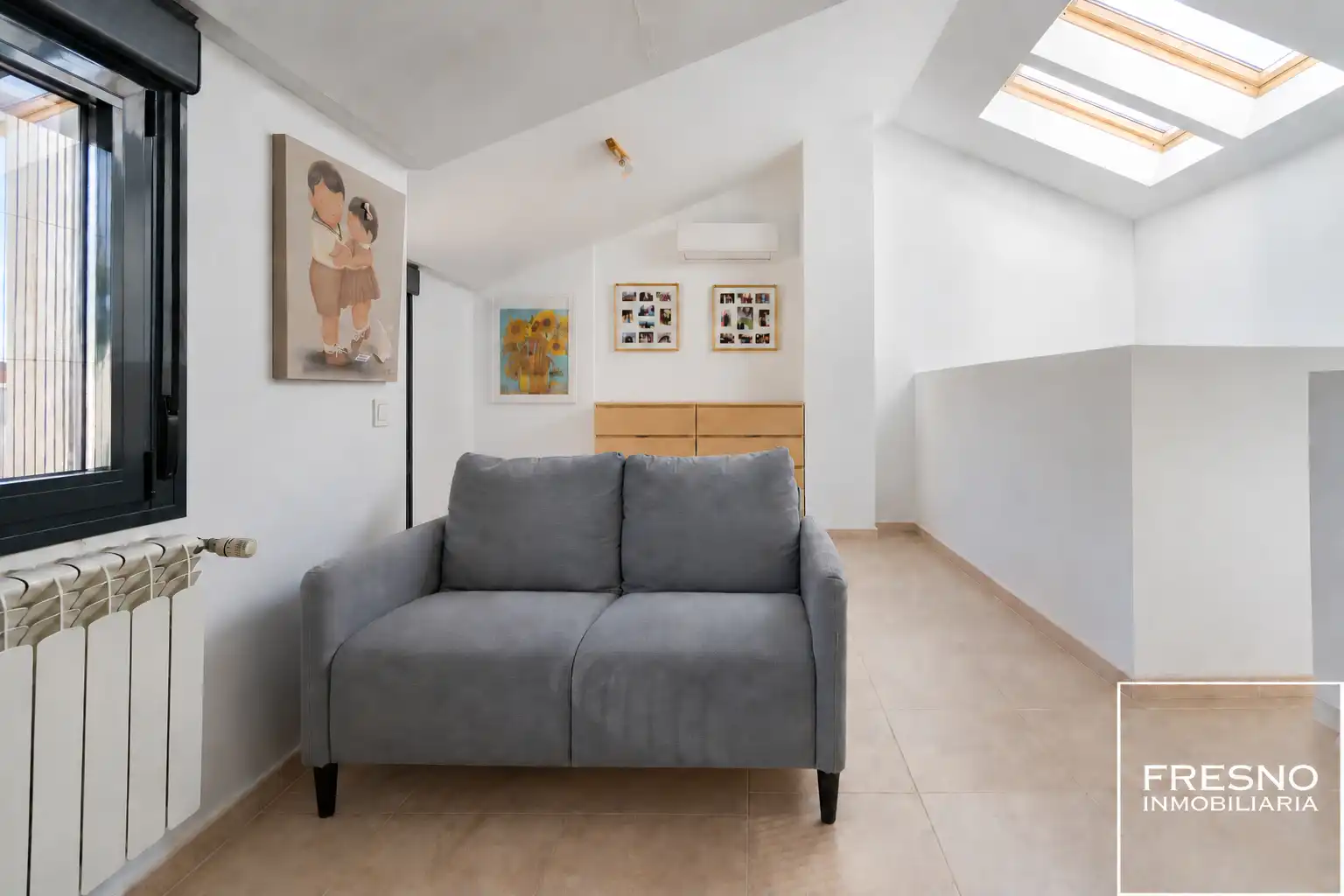 Sala de estar de Casa adosada en venta en Miramadrid