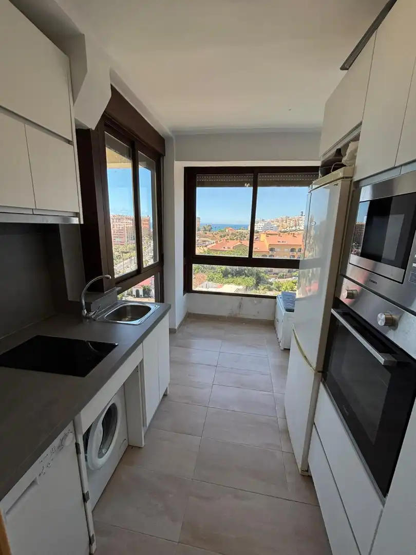 Cocina de Dúplex en venta en Benalmádena con Aire acondicionado, Terraza y Piscina comunitaria