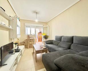 Sala d'estar de Apartament en venda en Torrevieja amb Calefacció, Terrassa i Piscina