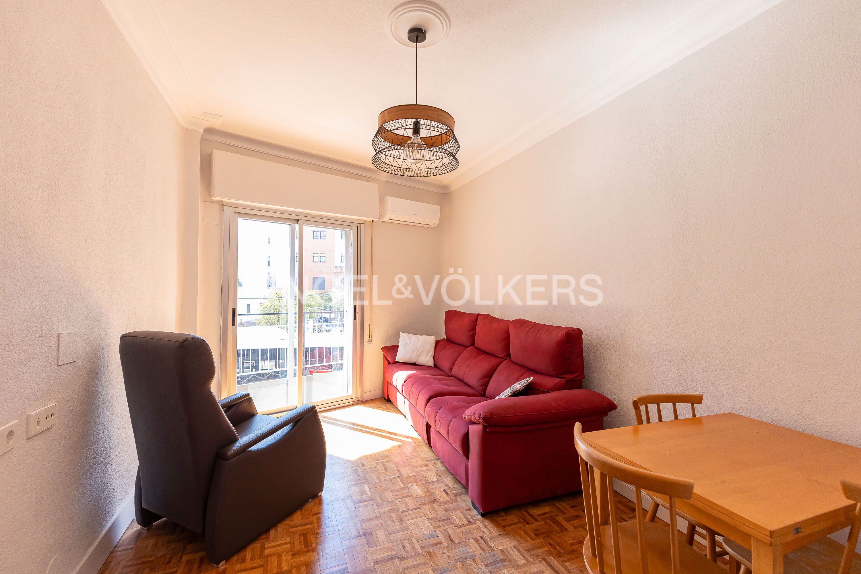 Living room of Apartment for sale in  Madrid Capital  with Air Conditioner, Heating and Parquet flooring