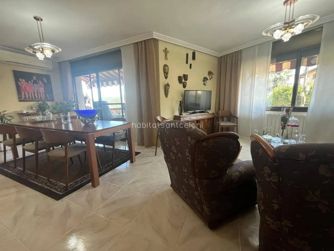 Sala d'estar de Casa adosada en venda en Sant Celoni amb Aire condicionat, Calefacció i Jardí privat