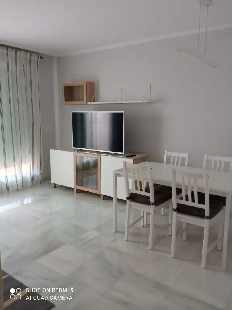 Sala d'estar de Pis de lloguer en Roquetas de Mar amb Aire condicionat, Calefacció i Terrassa