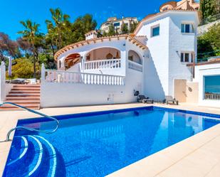 Piscina de Casa o xalet en venda en Moraira amb Jardí privat