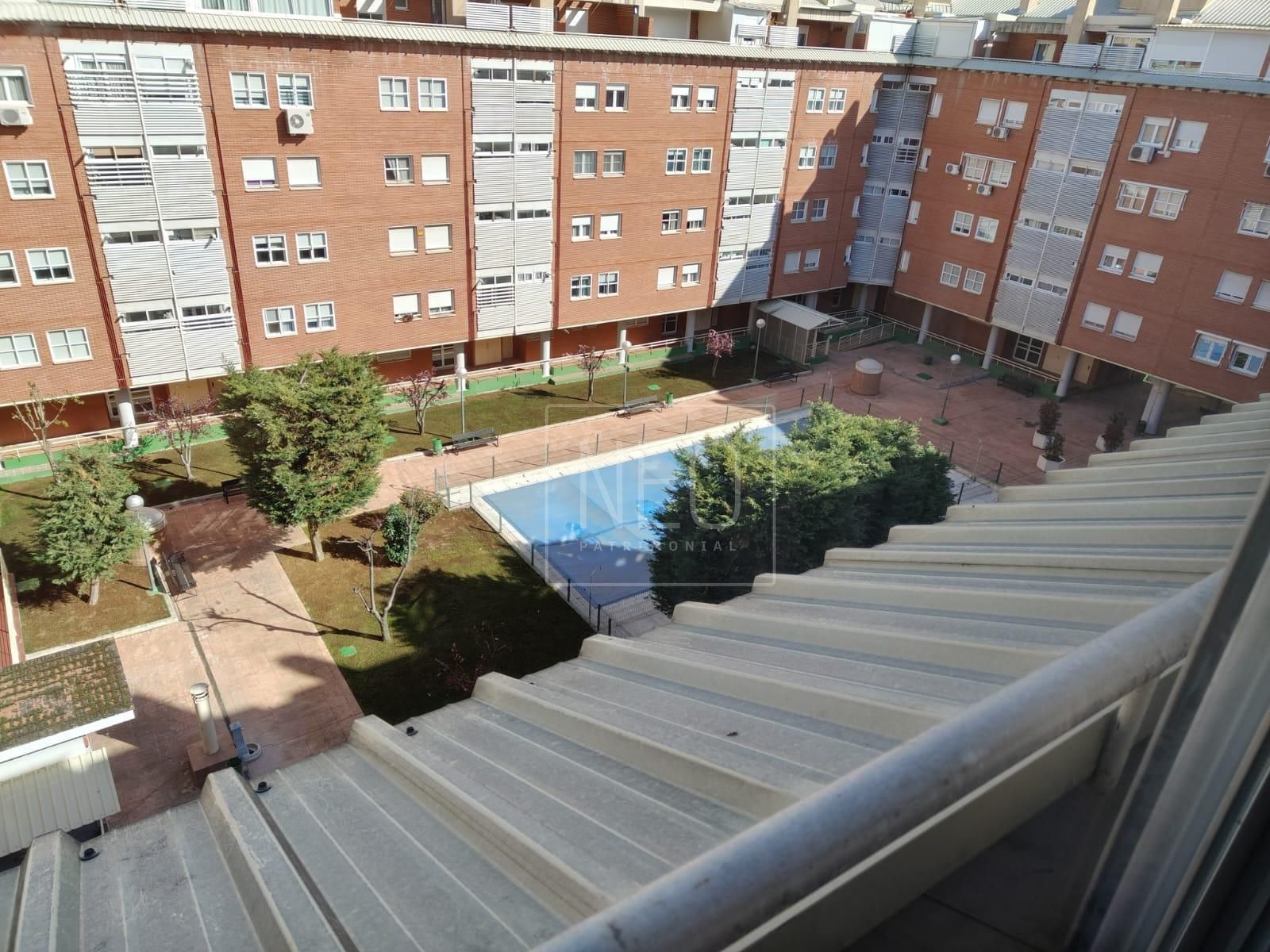 Swimming pool of Attic for sale in  Madrid Capital  with Air Conditioner, Heating and Private garden