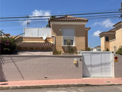 Exterior view of Single-family semi-detached for sale in Guardamar del Segura  with Air Conditioner, Terrace and Storage room