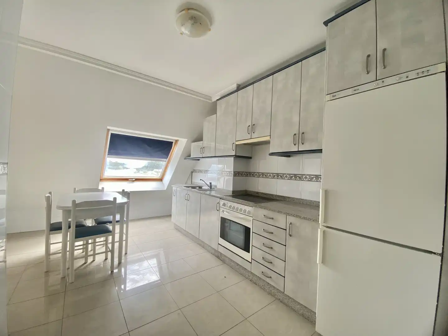 Kitchen of Attic for sale in O Grove    with Parquet flooring, Terrace and Storage room